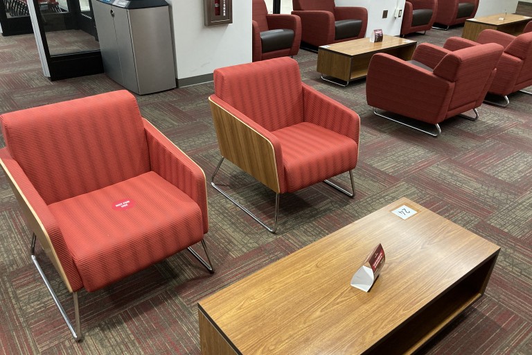 casual seating and coffee table in media services