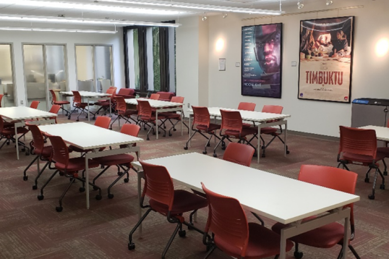 tabletop seating in media services with movie posters in the background